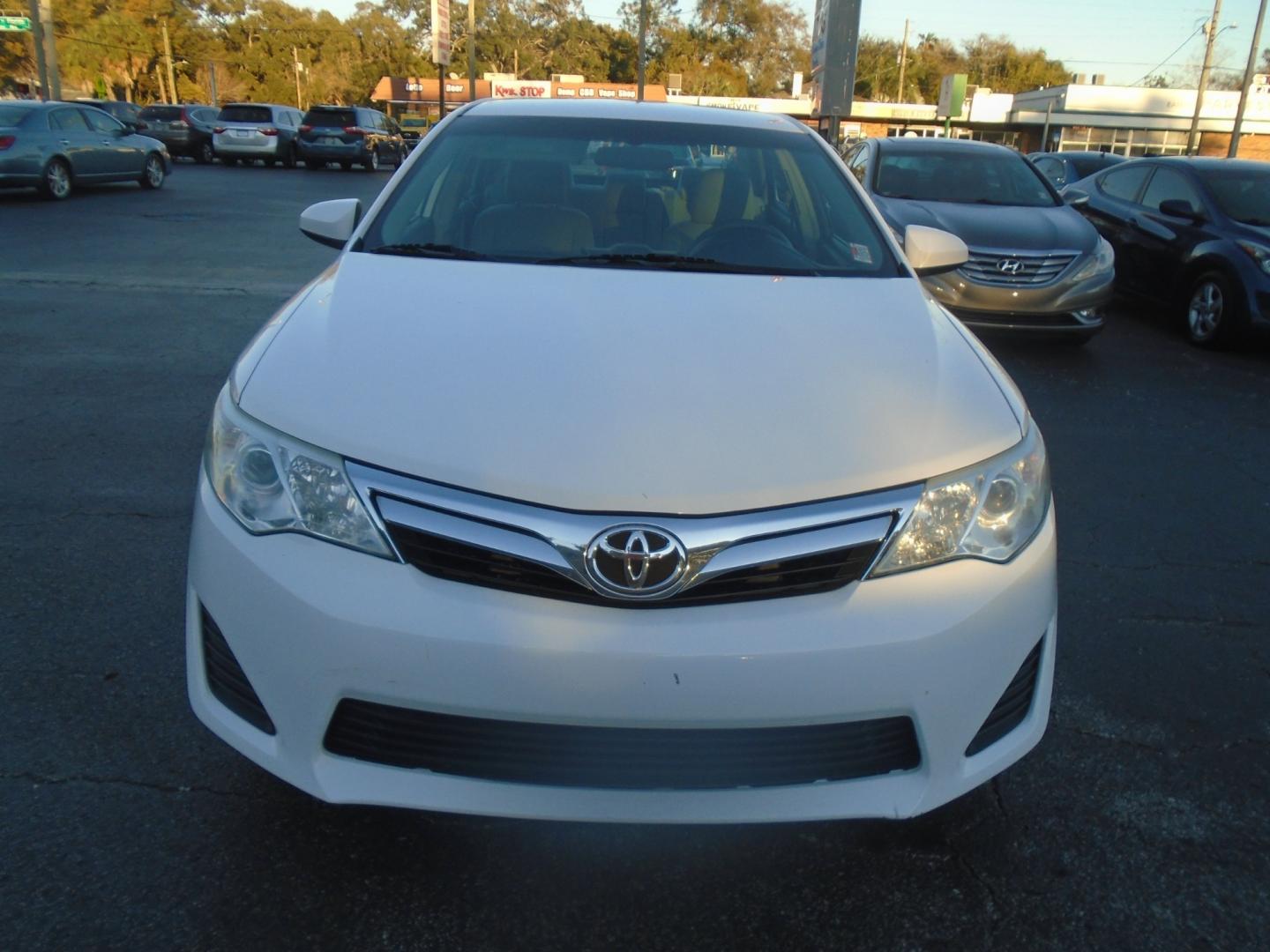 2014 Toyota Camry (4T1BF1FK0EU) , located at 6112 N Florida Avenue, Tampa, FL, 33604, (888) 521-5131, 27.954929, -82.459534 - Photo#1